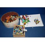 A box of old Venetian style glass and ceramic Beads and an oval box of a wooden painted beads,