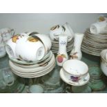 A part Royal Worcester 'Evesham' Teaset including eight plates, six cups and five saucers,