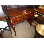 A Georgian mixed woods Lowboy/Side Table having cross-banding to the top,