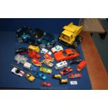 A box of toy cars including Matchbox and Corgi etc, and a blue remote car.