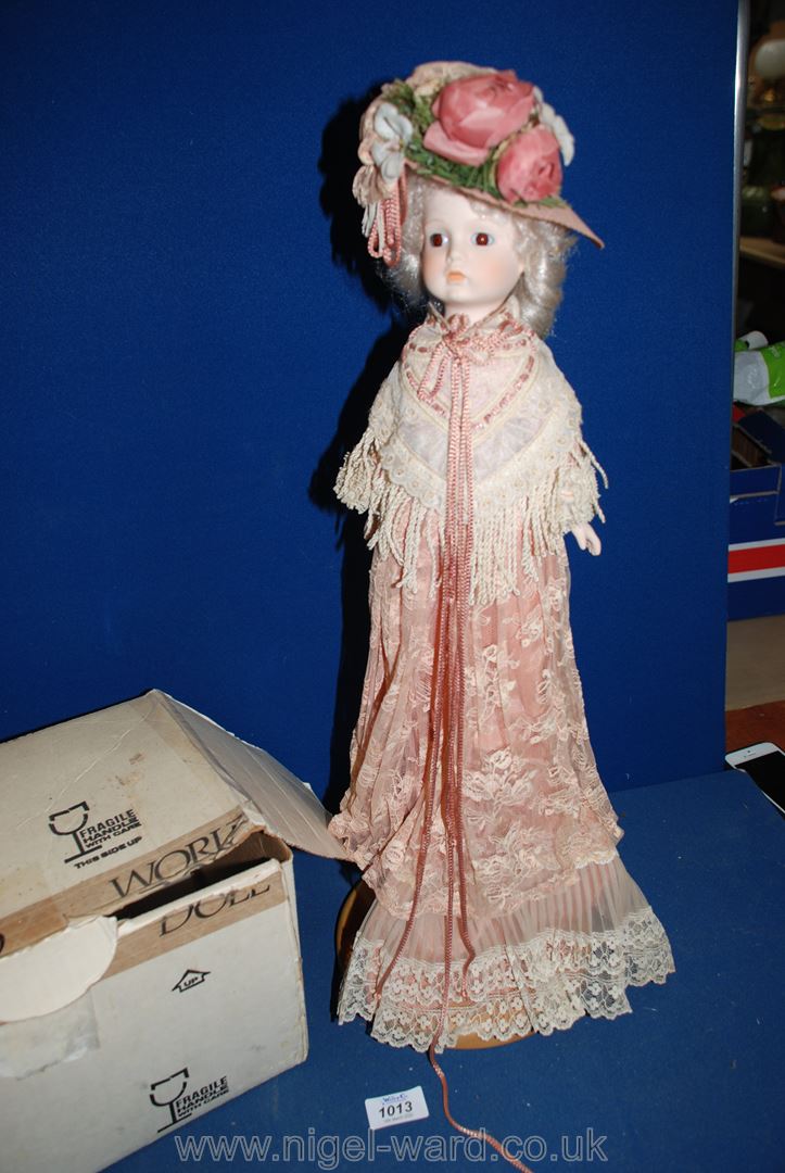 A Victorian china Doll made by Louis Nichole, hand crafted by 'World dolls', in original box.