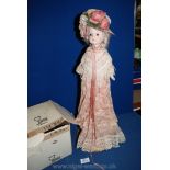 A Victorian china Doll made by Louis Nichole, hand crafted by 'World dolls', in original box.