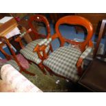 A set of six reproduction balloon back Dining Chairs including two carvers,