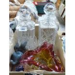 A box of glass including two decanters, one coloured, starfish dish, elephant,