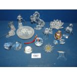 A box of mixed Swarovski crystal animals to include horse, penguin, dog, cat,