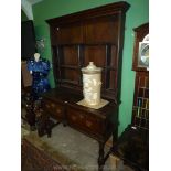 An early Oak cottage Welsh dresser of appealing dimensions,