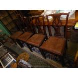 A set of four elegant Mahogany framed dining chairs of Chippendale style with intricately