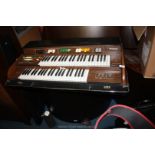 A 'John White' portable Organ includes zip bag with pedals,