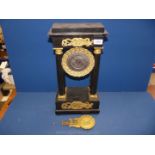 A French 19th c. ebonised pillar Clock with brass and gilt decoration.