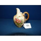 A Royal Worcester blush ground, hand painted Jug with gilt reeded handle.