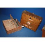 A Sanoid wooden first aid box (empty), no. A136 and a shoe cleaning kit in metal box.