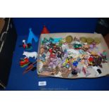 A quantity of plastic figures including Britain's farm figures and animals, Timpo cowboys etc.