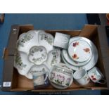 A quantity of china to include: Royal Worcester 'Evesham' dinner plates, side plates, tea plates,