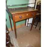 A Georgian Oak side Table standing on tapering square legs and having a frieze drawer with turned