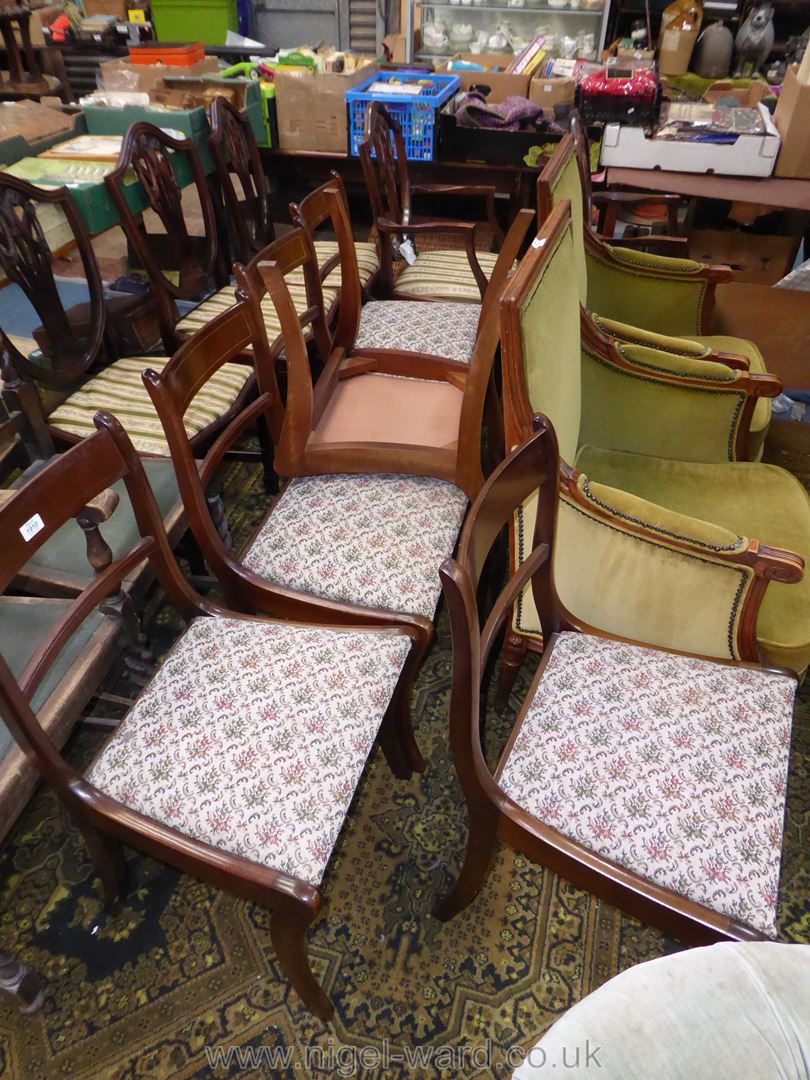 A set of six reproduction sabre-legged Mahogany framed Regency style Dining Chair with drop-in