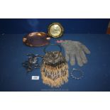 A box containing old purse, chain mail glove, bangle, copper ash tray etc.