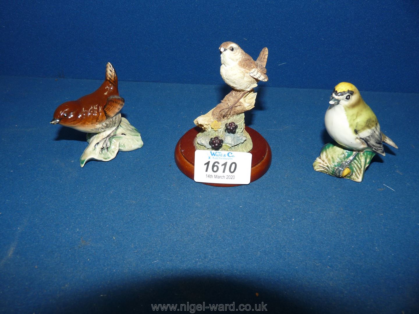 Two Beswick birds both having damage to beak; a Wren and a Goldcrest,
