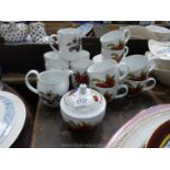 A quantity of Royal Worcester 'Evesham' tea and coffee ware including cups, mugs and milk jug,