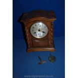 A Mantle Clock with twisted columns, with key.