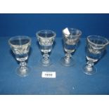 Four 'Penny Lick' glasses.