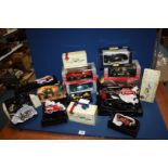 A box of Matchbox die cast models of Yesteryear including fire engines, Majorette AC COBRA 427,