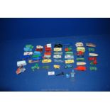 A quantity of Lesney die cast vehicles including boats, tractors, trucks etc.