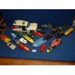 A large box of plastic racing cars and vehicles.