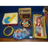 A Pelham puppet and vintage toys including tambourine, Fisher Price record player, etc.
