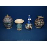 Four Islamic pottery Vases and jars including Persian Qajar vase.
