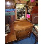 An appealing Old Charm/Priory Oak style compact Dressing Chest having three long drawers and