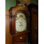An Oak cased Longcase Clock having painted arched dial with Arabic numerals,