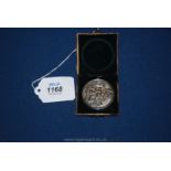 A Silver golf Medal from Ross golf club, Birmingham 1904, in a display box.