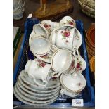 A Chodziez floral Teaset together with seven highly decorated cabinet Plates.
