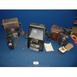 A leather cased Reflekka II twin reflex Camera together with a Cine Kodak eight and an Erno E-600
