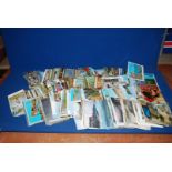 A box of 650+ Postcards to include English and the rest of the world, many stamped.