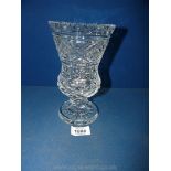 A Waterford cut glass vase on glass frog, 19 cms tall, small chip to rim.