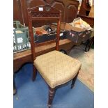 A Mahogany framed Edwardian side Chair having lattice detail fretworked top rail with stylised