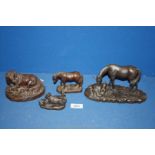 Four Heredities figures of horses.