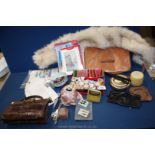 A box of haberdashery, cottons, tin buttons, patterns, china pin cushions, fur stole,