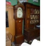 An Oak cased Longcase Clock having painted arched dial with Arabic numerals,