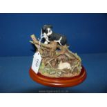 A Border Fine Arts, 'Found Safe', a sheepdog finding a lost lamb,8" long overall,