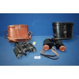 Two pairs of binoculars including a Tecuar 8 x 30 cased and one other a/f.