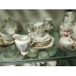 A quantity of Jackson and Gosling Grosvenor china comprising of five cups, four saucers, milk jug,