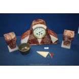 A marble Art Deco mantle clock with two garnitures Burgundy and cream a/f. Clock - 8 1/2" tall.