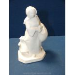 Annie Mouroux; A scarce Sevres art deco white porcelain figurine of a mother and child.