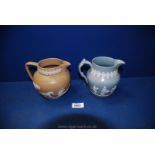 Two Copeland jugs with applied designs one of classic scenes on sage green ground the other of a