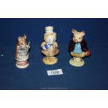 Three Beswick figures; 'Tailor of Gloucester', 'Pigling Bland', and 'Amiable Guinea-pig'.