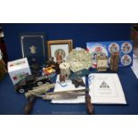 A quantity of miscellanea including brass sundial face, framed postcard, tin drum money box,