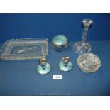 A part dressing table set with blue enamel candlesticks and an enamelled powder bowl,