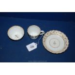 A good Barr Worcester spiral moulded gilt and white trio,